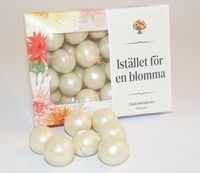 I st&auml;llet f&ouml;r en blomma - P&auml;rlemorlakrits 100g i ask B