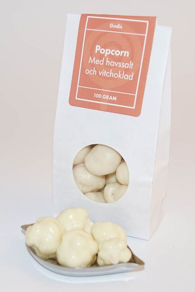 Popcorn med havsalt/vit choklad Produktbild f&ouml;r Popcorn with sea salt / white chocolate in white bag