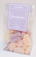 Produktbild för Citrusklyftor örtkarameller i ståpåse