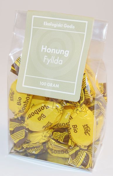Produktbild för Honung EKO fylld med papper örtkarameller i ståpåse Produktbild för Honey BIO filled with paper herbal candies in a standing bag