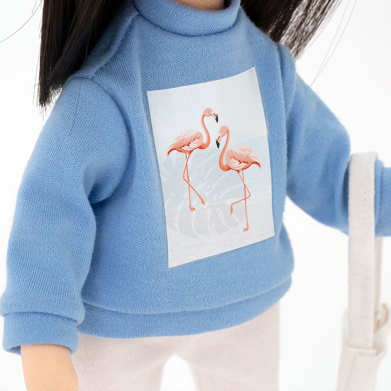 Lilu in a Light Blue Sweatshirt