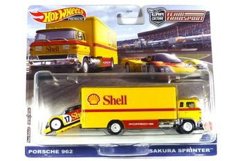 "Hot Wheels FLF56-HCR34 Porsche 962 + Sakura Sprinter "Shell" gul - Team Transport #45 skala ca 1"