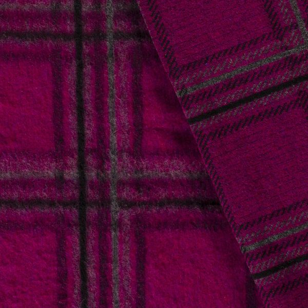 fin stickad ullliknande vara som har borstat utseende.