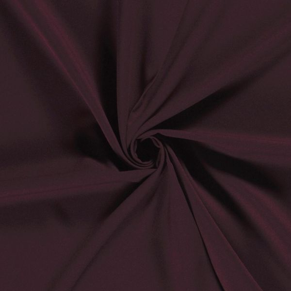 Burlington tyg i djup vinr&ouml;d nyans &ndash; slitstarkt och enf&auml;rgat med t&auml;t v&auml;v, idealiskt f&ouml;r kavajer, kostymer, kjolar och andra v&auml;lsittande plagg.