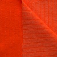 N&auml;rbild p&aring; randstickad jersey i neonorange, 150 cm bred.