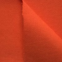 N&auml;rbild p&aring; stretchig twill i orange, 130 cm bred.