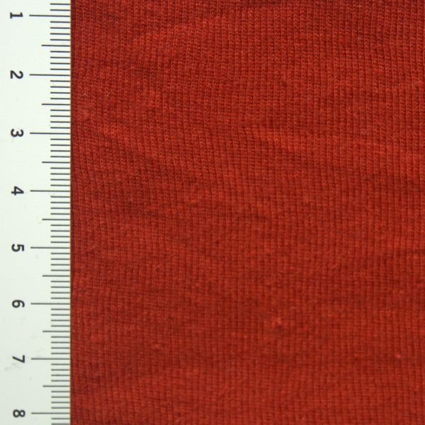 N&auml;rbild p&aring; tegelr&ouml;d finribb i 100% bomull, 150 cm bred.
