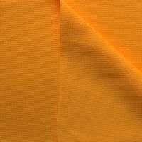 N&auml;rbild p&aring; orange polyesterjersey, 150 cm bred.