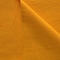 N&auml;rbild p&aring; orange pik&eacute; i 100% bomull, 130 cm bred.