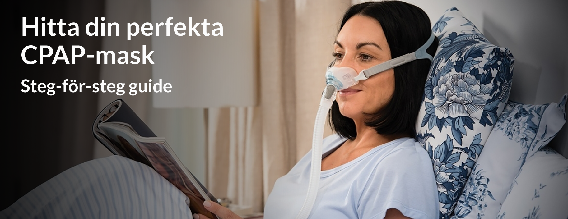 Kvinna i säng med CPAP-mask