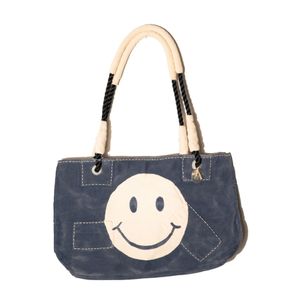 Dora Blue, Smiley Logo | Sufraco House of Fine Brands